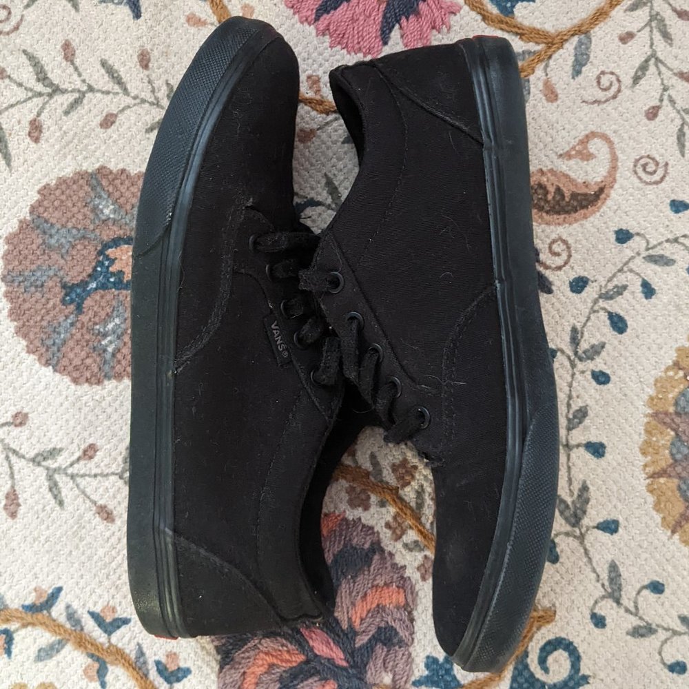 Black monochrome Vans